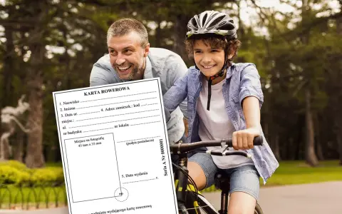 Ojciec i syn na rowerach, z dokumentem "Karta Rowerowa". Dzięki niej można jeździć na rowerze.
