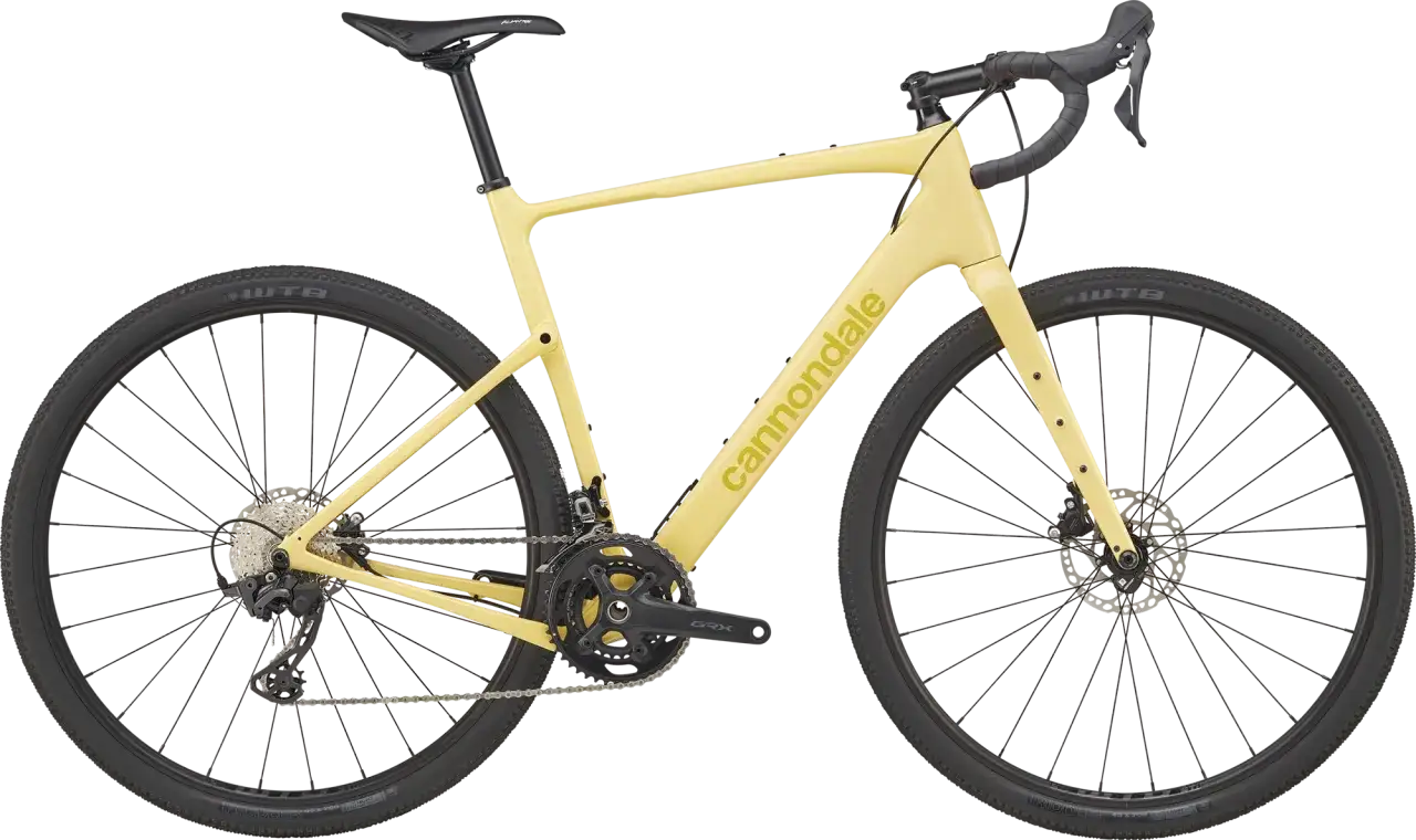 Żółty rower gravelowy Cannondale Topstone Carbon 3 z napędem Shimano GRX i oponami WTB. Gotowy na każdą przygodę.